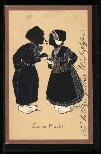 Künstler-AK Alwin Freund: Kleines Paar in Tracht nascht gemeinsam Kirschen