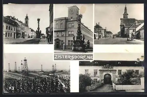 AK Zistersdorf, Strassenpartie, Blick auf Denkmal und Öltürme