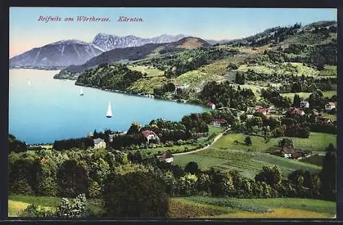 AK Reifnitz am Wörthersee, Ortsansicht mit See und Bergpanorama
