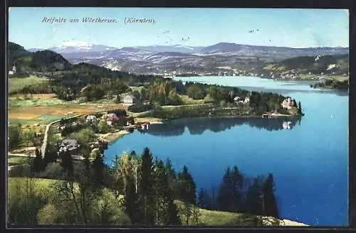 AK Reifnitz am Wörthersee, Ortsansicht mit See und Bergblick