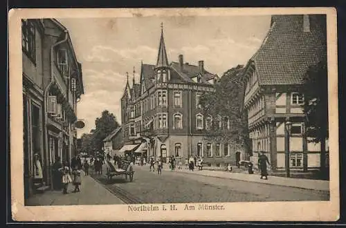 AK Northeim i. H., Am Münster mit Geschäften