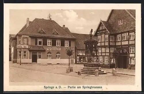 AK Springe, Strassenpartie am Springbrunnen und Gasthof Deutsches Haus