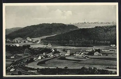 AK Jünkerath, Totalansicht mit Bahnstrecke, Kirche, Ortspanorama in der Ferne