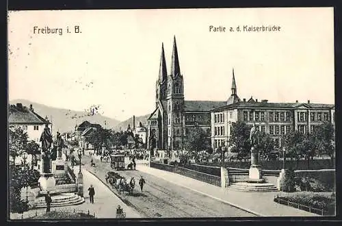 AK Freiburg i. B., Partie an der Kaiserbrücke mit Strassenbahn