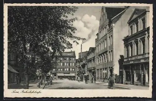 AK Peine, Bahnhofstrasse mit Geschäften