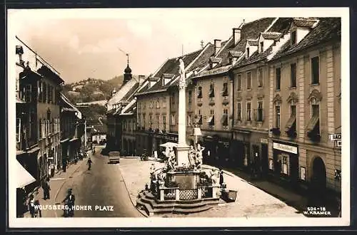 AK Wolfsberg /Kärnten, Hoher Platz mit Mariensäule und Geschäften