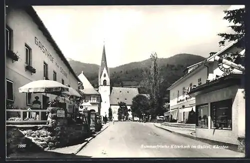 AK Kötschach i. Galltal, Strassenpartie mit Gasthaus zur Sonne