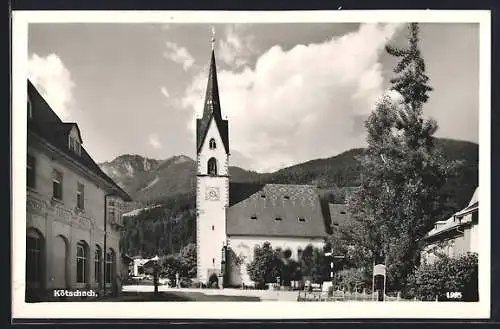 AK Kötschach, Ortspartie mit Kirche und Kaufhaus Rizzi