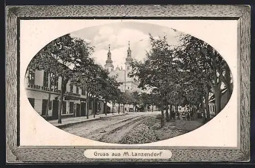 AK Maria Lanzendorf, Strassenpartie mit Gasthaus u. Fleischhauerei und Kirche, Passepartout