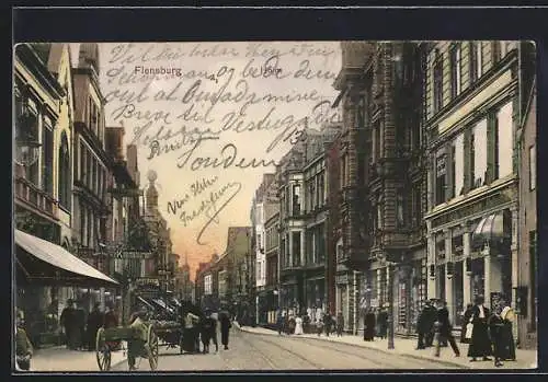 AK Flensburg, Strassenpartie mit Geschäften und Apotheke