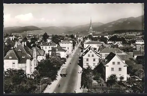 AK Müllheim i. B., Strassenpartie mit Kirche