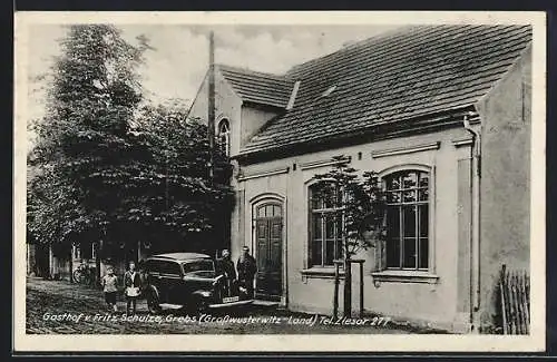 AK Grebs bei Grosswusterwitz, Gasthof von Fritz Schulze, davor ein Automobil