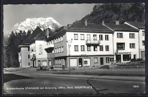 AK Stainach /Stmk., Hauptplatz mit Geschäften und Grimming