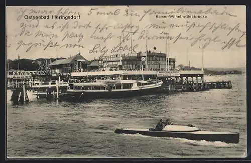 AK Heringsdorf / Seebad, Kaiser-Wilhelm-Seebrücke, mit Motorboot