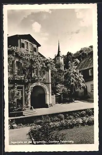 AK Jugenheim /Bergstrasse, Gasthaus Tannenberg A. Weckenmann Erben mit Kirchturm