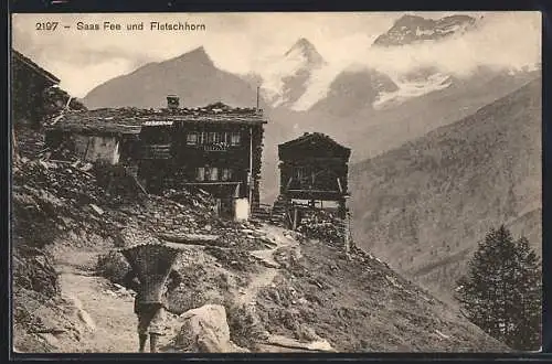 AK Saas Fee, Ortspartie mit Häusern und Fletschhorn