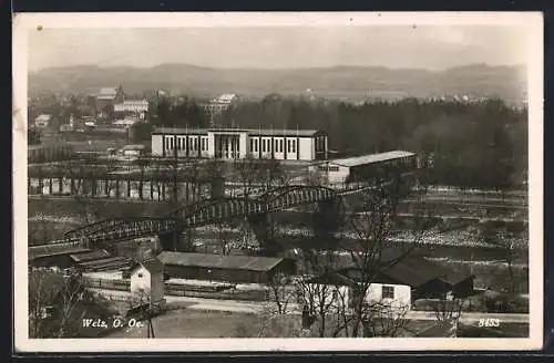 AK Wels /O. Oe., Ortspartie mit Brücke