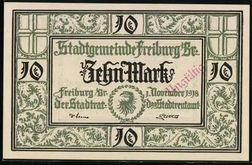 Notgeld Freiburg 1918, Zehn Mark, grüne Verzierungen und Stadtwappen, Seriennummer 32052, Stempel Ungültig