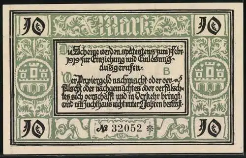 Notgeld Freiburg 1918, Zehn Mark, grüne Verzierungen und Stadtwappen, Seriennummer 32052, Stempel Ungültig