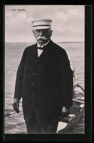 AK Graf Zeppelin mit Schirmmütze und einem Boot am Ufer