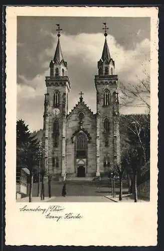 AK Sonneberg /Thür., Strassenpartie mit evangelischer Kirche