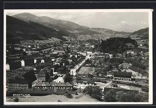 AK Bruck a. d. Mur, Ortsansicht mit Blick in die Berge