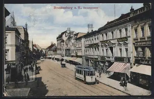AK Brandenburg / Havel, Hauptstrasse, Strassenbahn zur Kaserne, Geschäfte, Leute