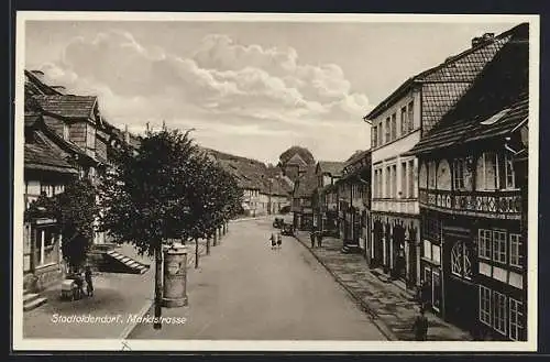 AK Stadtoldendorf, Marktstrasse mit Litfasssäule