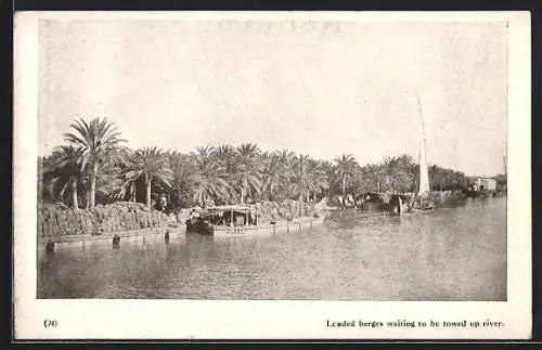 AK Iraq, Loaded Barges waiting to be towed up river