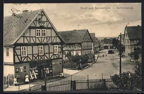 AK Gensungen, Bahnhofstrasse mit Geschäft Wittich aus der Vogelschau