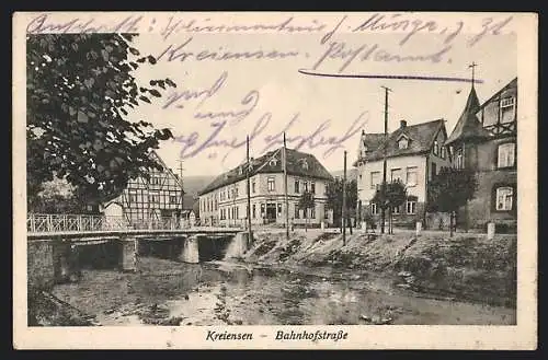 AK Kreiensen, Bahnhofstrasse mit Flusspartie