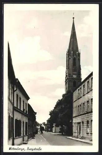 AK Wittenberge, Burgstrasse mit Kirchturm