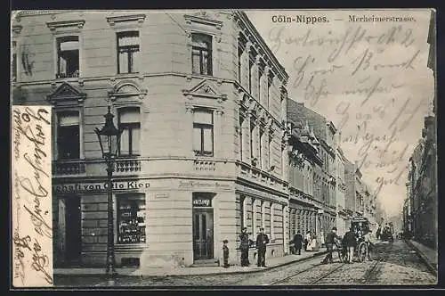 AK Köln-Nippes, Kornbranntwein-Brennerei Gasthaus von Otto Kiep in der Merheimerstrasse mit Passanten und Strassenbahn