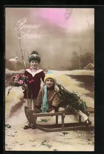 AK Knabe und Mädchen mit einem Schlitten, Neujahrsgruss