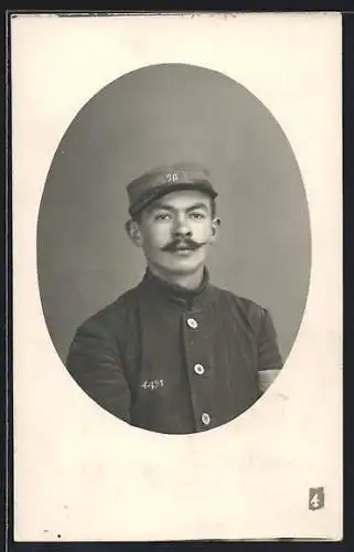 Foto-AK Königsbrück, Portrait eines Kriegsgefangenen Franzosen