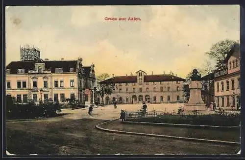 AK Aalen, Strassenansicht mit Bahnhof und Denkmal