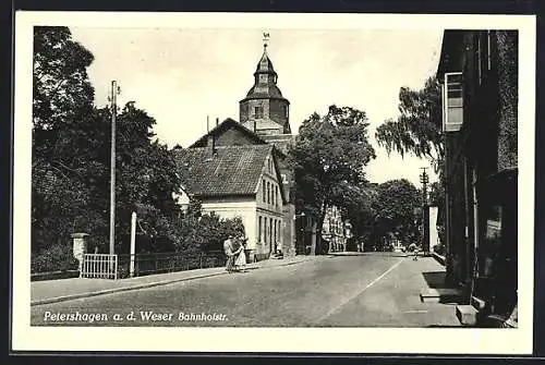 AK Petershagen /Weser, Bahnhofstrasse mit Kirchturm