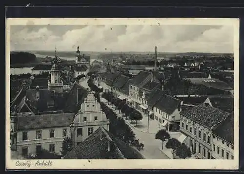 AK Coswig-Anhalt, Blick über die Stadt mit Geschäften