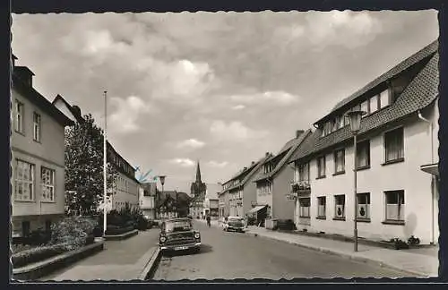 AK Osterode am Harz, Blick in die Berlinerstrasse mit Opel Auto