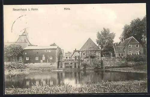 AK Neuenhaus / Hann., Uferpartie mit Blick zur Mühle
