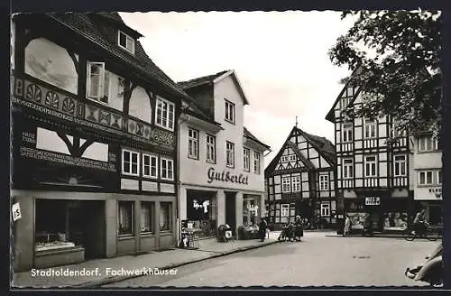 AK Stadtoldendorf, Strassenpartie mit Fachwerkhäusern / Geschäften