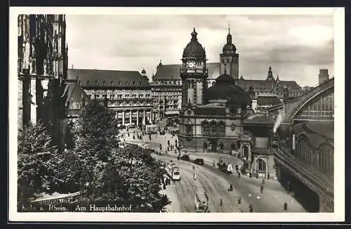 AK Köln a. Rhein, Am Hauptbahnhof, Strassenpartie aus der Vogelschau