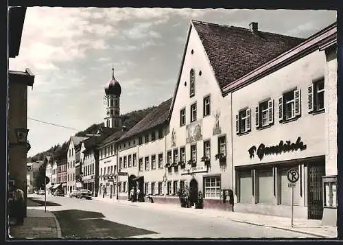 AK Wolfratshausen /Obb., Strassenpartie am Gasthof Haderbräu