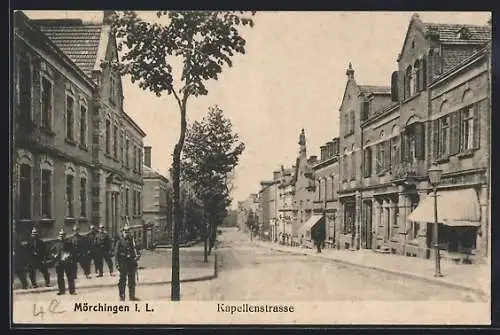 AK Morhange, Le rue de la Chapelle, Soldats allemands et Boutiques