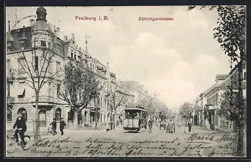 AK Freiburg i. B., Zähringerstrasse mit Restaurant zum Löwen mit Strassenbahn