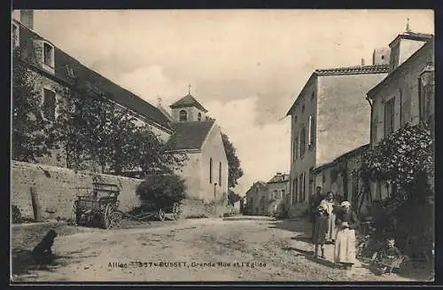 AK Busset /Allier, Grande Rue et l`Eglise