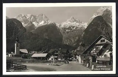 AK Lofer, Ortspartie mit Kirche und Loferer Steinbergen