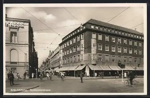 AK Köln-Mülheim, Buchheimerstrasse mit Verkehrspolizist