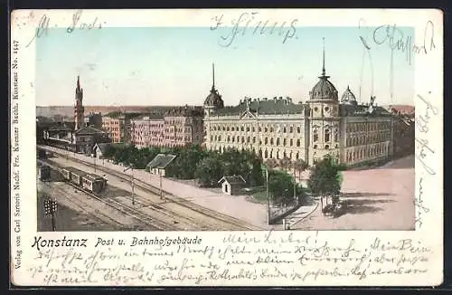 Goldfenster-AK Konstanz, Post und Bahnhofgebäude mit leuchtenden Fenstern