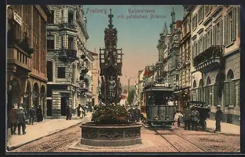 AK Freiburg i. B., Blick in die Kaiserstrasse gegen den gothischen Brunnen, Strassenbahn